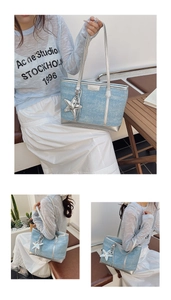 Detail of light blue denim texture tote bag with silver trim and star charm