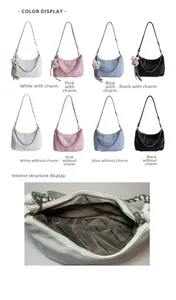 Macro details of litchi texture tote bag with bear charm and internal zipper storage