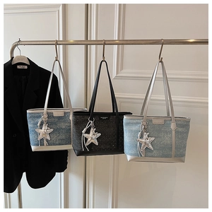 Detailed comparison of three tote bags in denim, sequin, and fabric textures with star charms