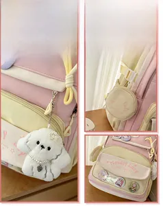 Detailed view of pink and yellow school backpack with cute plush dog pendant and accessories