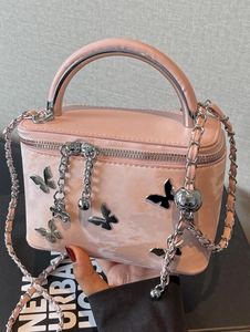 Pink box hand bag with silver butterfly decoration and leather chain shoulder strap
