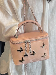 Pink patent leather box bag with silver butterflies and chain strap for women