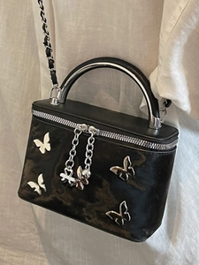 Elegant black box handbag with butterfly ornaments and silver chain strap for women
