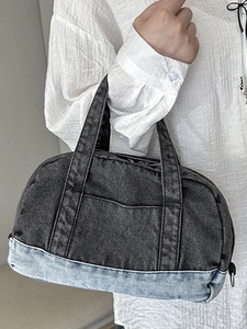Vintage patchwork denim handbag with double handles and front pocket for casual women wear