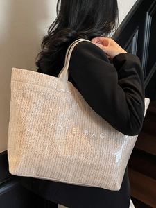 Large woven tote bag with waterproof PVC layer and TOTE BAG lettering for women