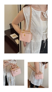 Pink ostrich pattern mini box bag with gold chain strap and rose metal clasp