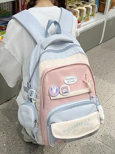 Pastel macaron student backpack with multiple pockets and cute bunny brooch accessory