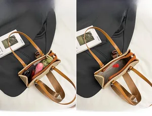 Detail view of woven straw tote bag showing internal capacity for phone and daily items