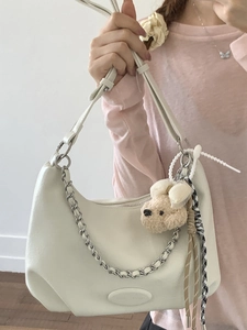 Minimalist beige large capacity shoulder bag with bear pendant and woven charm decoration