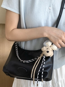 Minimalist black large capacity shoulder bag with silver chain and cute plush dog charm