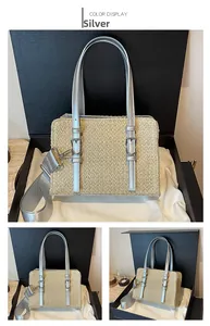 Detailed macro view of straw woven bag with silver metallic straps and textured finish
