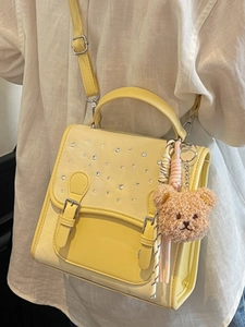 Fashionable bright yellow PU leather backpack with rhinestone accents and bear pendant