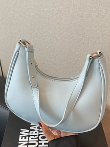 Light blue crescent hobo shoulder bag with gold hardware and smooth synthetic leather