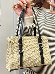 Minimalist straw weave crossbody bag with black leather straps and silver buckles for women