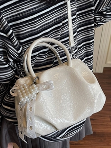 Chic white pleated crossbody bag with pearl heart and lace bow detail for women
