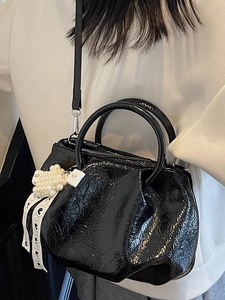 Chic black glossy pleated handbag with pearl flowers and white lace bow for summer styling