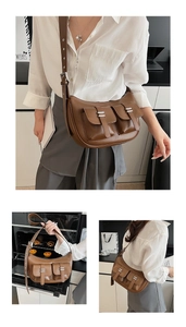 Detail view of retro brown PU leather tote bag with multi-pocket design and silver buckles