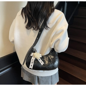 French style black wrinkled leather underarm bag with lace bow and pearl heart detail