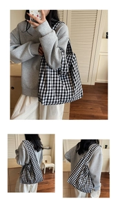 Detailed views of checkered canvas tote bag showing shoulder strap and interior capacity