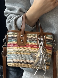 Bohemian colorful striped woven handbag with brown leather trim and silver star charm