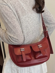 Retro red crescent tote bag in matte leather with double front pockets and silver hardware