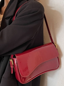 Elegant dark red patent leather shoulder bag with a stylish magnetic flap for women