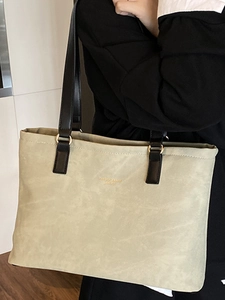 Minimalist large tote bag in beige suede with slim black leather shoulder straps