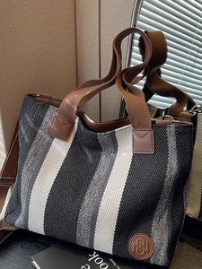 Striped woven canvas tote bag with large capacity and brown leather handles