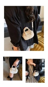 Detailed views of cream mini bowling bag with metal bow and adjustable strap