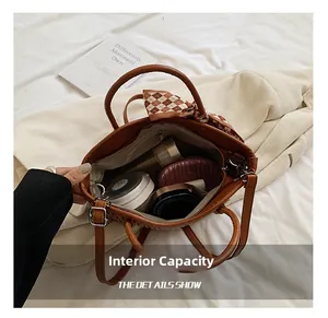 Detail showing high-capacity interior of brown woven tote bag with daily essentials
