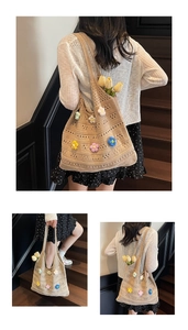 Detailed close-up of beige knit tote bag featuring colorful 3D floral crochet accents