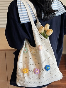 Beige crochet hollow tote bag with colorful 3D knit flowers for summer beach casual style