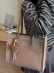Taupe large capacity tote bag in lychee pattern leather with cute bear charm for office