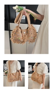 Detail showing the apricot crochet tote bag with colorful pearls and fringe tassels