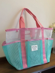Pink and mint green mesh beach bag with multi-pocket design for summer swimming gear