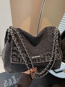 Retro denim chain tote bag in washed dark grey with silver metal strap for daily commuting