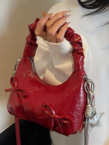 Red bow shoulder bag with star charm and ruched handle for 2025 summer commute