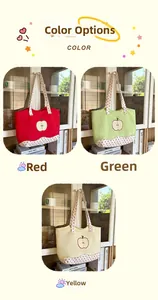 Three colorful tote bags with apple patterns and red polka dot straps in a home setting