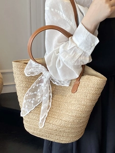 Large capacity woven straw tote bag with lace bow decoration for summer beach vacations