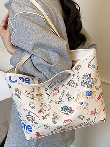 Chic off-white large capacity tote bag with colorful graffiti prints and slim shoulder straps