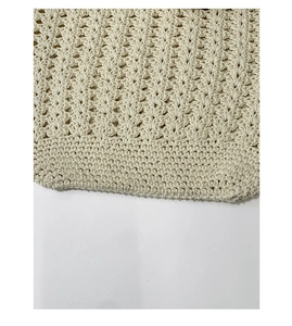 Détail du sac en coton tissé à la main montrant des motifs de crochet en V complexes