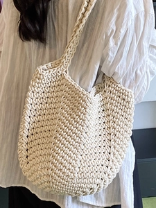 Minimalist cream handmade crochet tote bag for women shown as a casual shoulder bag
