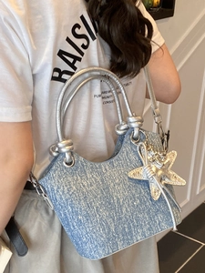Blue glitter bucket bag with nautical rope handle and silver starfish charm accessory