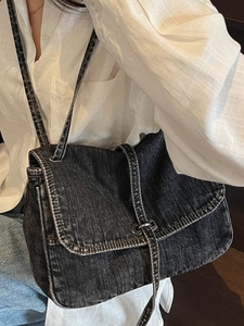 Retro black washed denim crossbody bag for women with flap cover and metal buckle closure