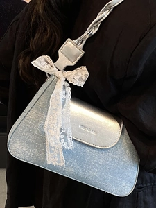 Blue denim and silver metallic crossbody bag with lace bow and miss & she logo