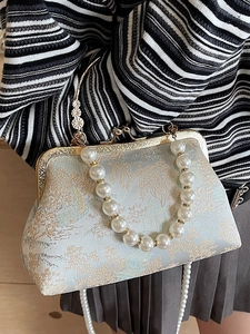 Retro Chinese style blue embroidery shoulder bag with pearl handle and metal frame