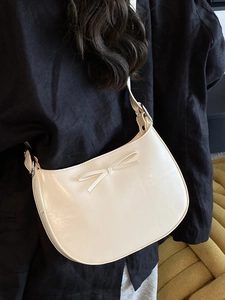 Sac sous le bras minimaliste beige en demi-lune avec nœud et bandoulière réglable