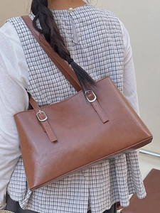 Classic dark brown tote bag in glossy PU leather for women with silver buckle accents