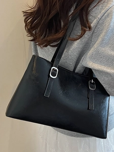 Minimalist black PU leather tote bag with silver buckles and large capacity for women