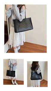 Détails de ce sac fourre-tout noir avec motifs géométriques découpés et bandoulière élégante